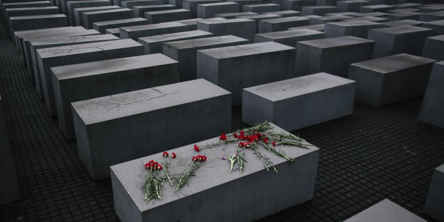 In this January 27, 2015 file photo, flowers lay on a concrete slab of the Holocaust Memorial.