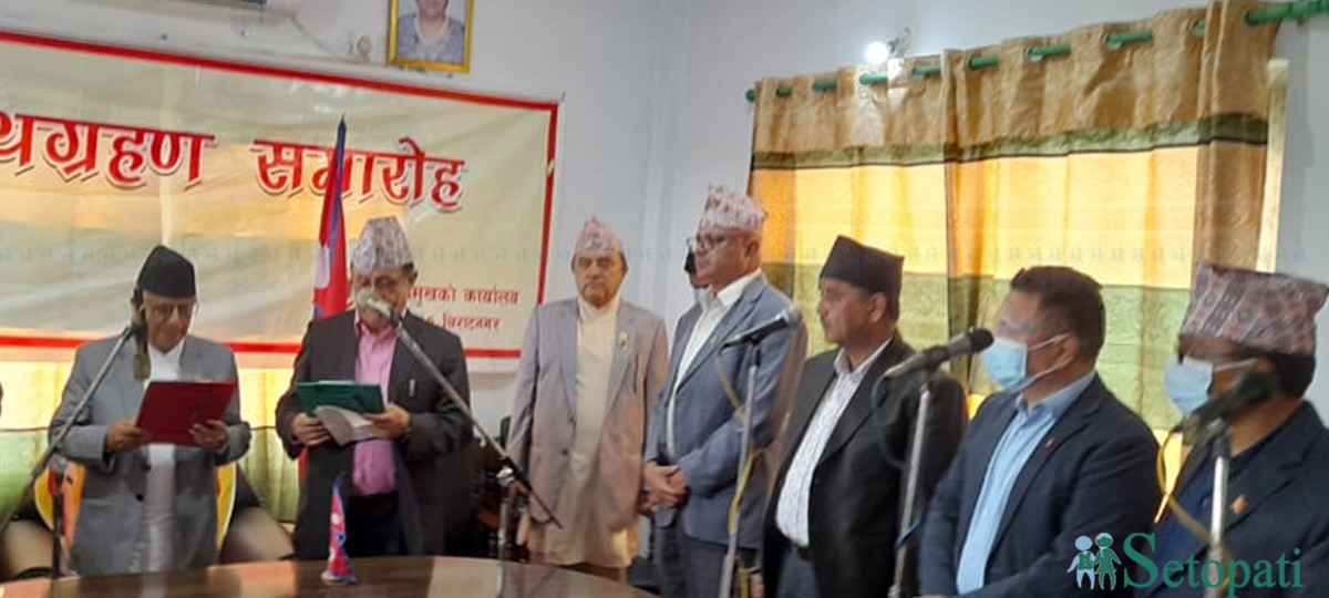 Acharya being sworn in as Province 1 CM.