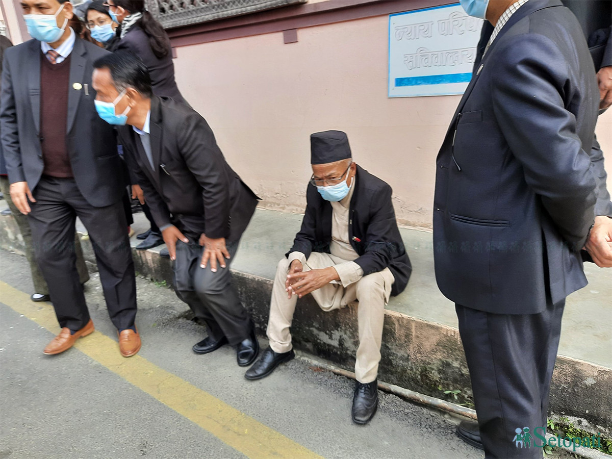 NBA Chairman Shrestha rests after falling during the clash with police on Thursday.