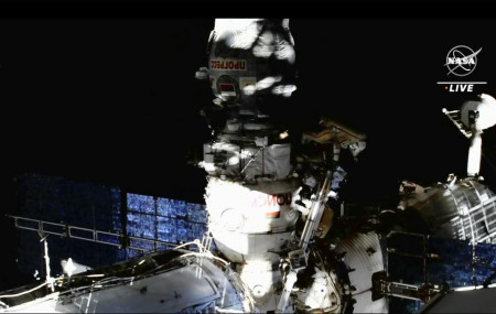 This image provided by NASA, Italian astronaut Samantha Cristoforetti and Russian cosmonaut Oleg Artemyev perform maintenance on the International Space Station on Thursday, July 21, 2022. (N