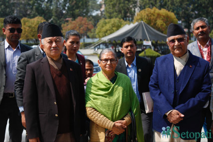 UML candidate Shakya (center) going to file nomination along with party leaders.