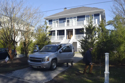 FILE - U.S. Secret Service agents are seen in front of Joe Biden's Rehoboth Beach, Del., home on Jan. 12, 2021. AP/RSS Photo