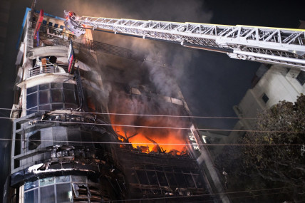 Firefighters work to contain a fire that broke out at a commercial complex in Dhaka, Bangladesh, Thursday, Feb. 29, 2024. (AP/RSS Photo)