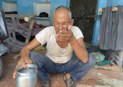 An elderly man splashes water on his face to cool himself on a hot summer afternoon in Lalitpur, Uttar Pradesh state, India, Saturday, June 17, 2023.  AP/RSS Photo