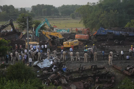 Policemen stand guard at the site where trains that derailed, in Balasore district, in the eastern Indian state of Orissa, Sunday, June 4, 2023.  AP/RSS Photo