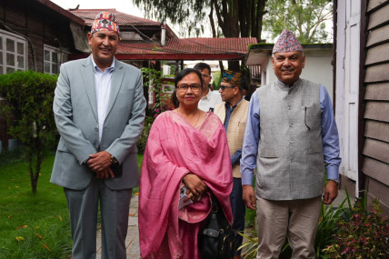 Ishwari Devi Neupane (center) with Ramhari Khatiwada (left) and Shyam Ghimire