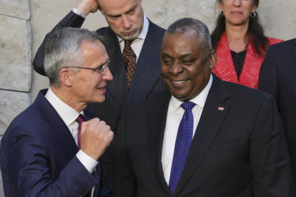 NATO Secretary General Jens Stoltenberg, left, speaks with U.S. Secretary for Defense Lloyd J. Austin III during a group photo of NATO defense ministers at NATO headquarters in Brussels, Thursday, Oct. 13, 2022. AP/RSS Photo