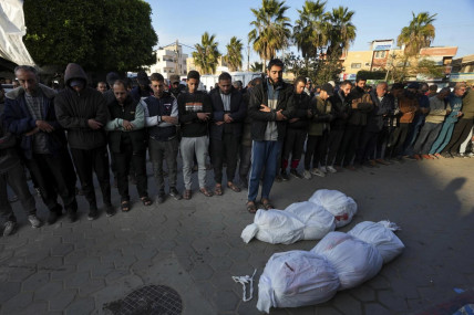 Palestinians pray for the relatives killed in the Israeli bombing in the Gaza Strip at Al Aqsa Hospital in Deir al Balah, Gaza Strip, on Saturday, Feb. 17, 2024. (AP/RSS Photo)