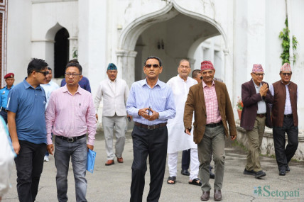 FILE - Mukunda Shyam Giri (center), Dhawal Shumsher Rana (right) and other RPP leaders at the Election Commission.