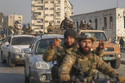 Syrian opposition fighters ride along the streets in the aftermath of the opposition’s takeover of Hama, Syria, Friday, Dec. 6, 2024. AP/RSS Photo