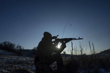"Sirko", a Ukrainian serviceman of Karpatska Sich battalion tests his AK-74 rifle near the recently retaken town of Lyman, Ukraine, Sunday, Jan. 8, 2023. AP/RSS Photo