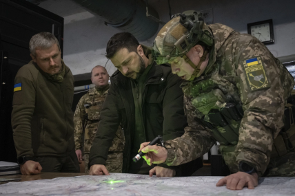 Ukrainian President Volodymyr Zelenskyy, Commander of Ukraine's Ground Forces Col.-Gen. Oleksandr Syrsky, right, and Roman Mashovets, deputy head of the Presidential Office, look at a map during their visit to the front-line city of Kupiansk, Kharkiv region, Ukraine, Thursday, Nov. 30, 2023.  AP/RSS Photo
