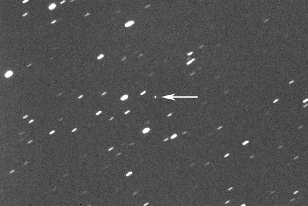 This photo provided by Gianluca Masi shows asteroid 2023 DZ2, indicated by arrow at center, about 1.8 million kilometers (1.1 million miles) away from the Earth on March 22, 2023.  AP/RSS Photo