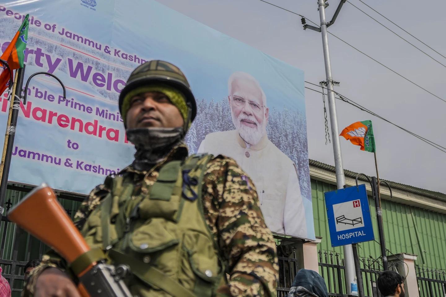 A paramilitary soldier guard near a road barricade set up by security forces ahead of Indian Prime Minister Narendra Modi's visit to Srinagar, Indian controlled Kashmir, Wednesday, March 6, 2024. (AP/RSS Photo)