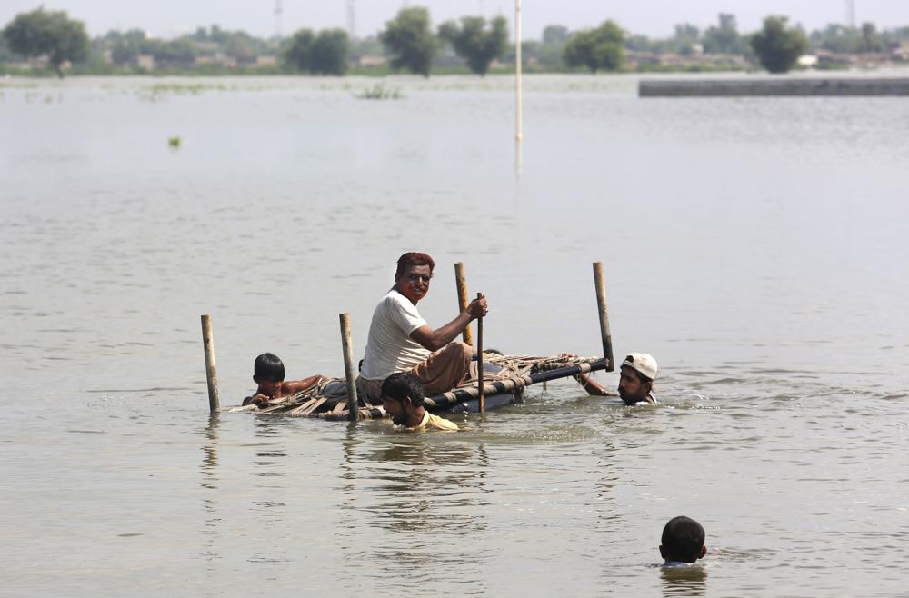 People use cot to salvage belongings from their nearby flooded home caused by heavy rain in Jaffarabad, a district of Pakistan's southwestern Baluchistan province, Saturday, Sep. 3, 2022. AP/RSS Photo
