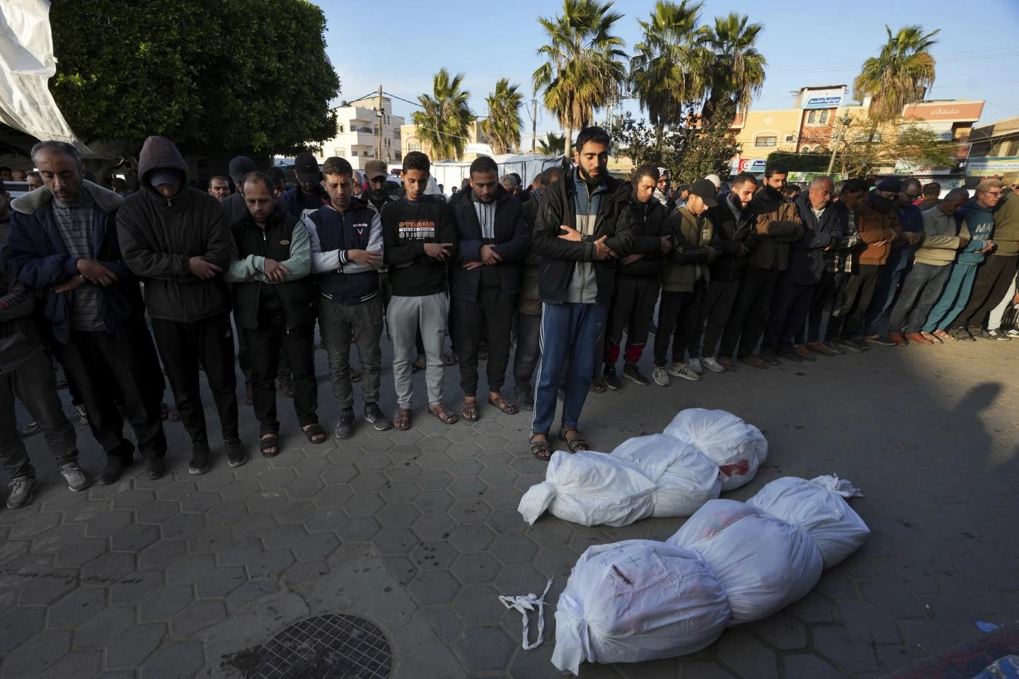 Palestinians pray for the relatives killed in the Israeli bombing in the Gaza Strip at Al Aqsa Hospital in Deir al Balah, Gaza Strip, on Saturday, Feb. 17, 2024. (AP/RSS Photo)