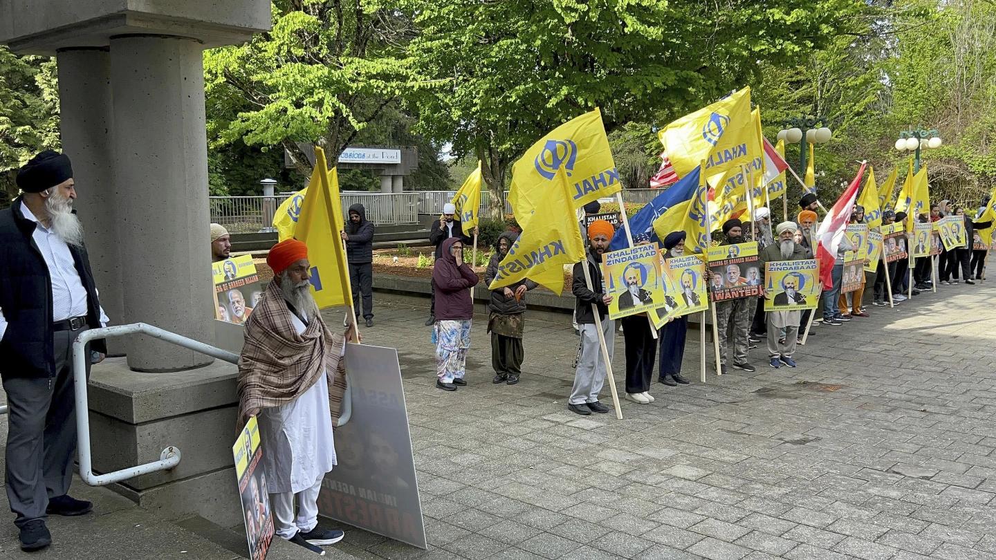 Members of British Columbia's Sikh community gather in front of the courthouse in Surrey, British Columbia, Tuesday, May 7, 2024. (AP)