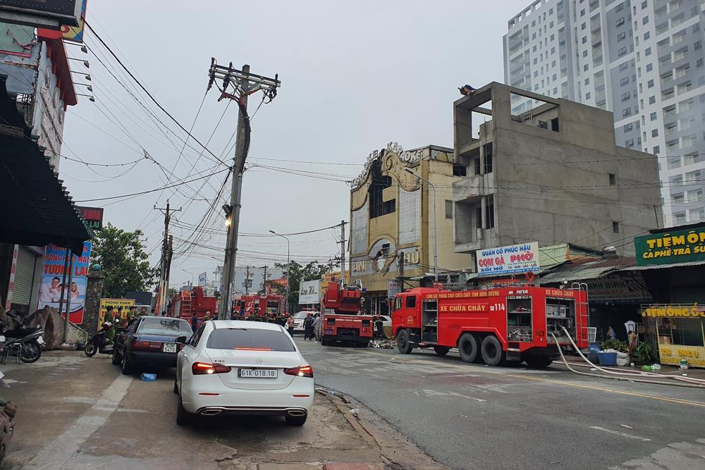 Fire department trucks line outside a karaoke parlor following a fire Wednesday, Sept 7, 2022, in Thuan An city, southern Vietnam. (AP/RSS Photo)