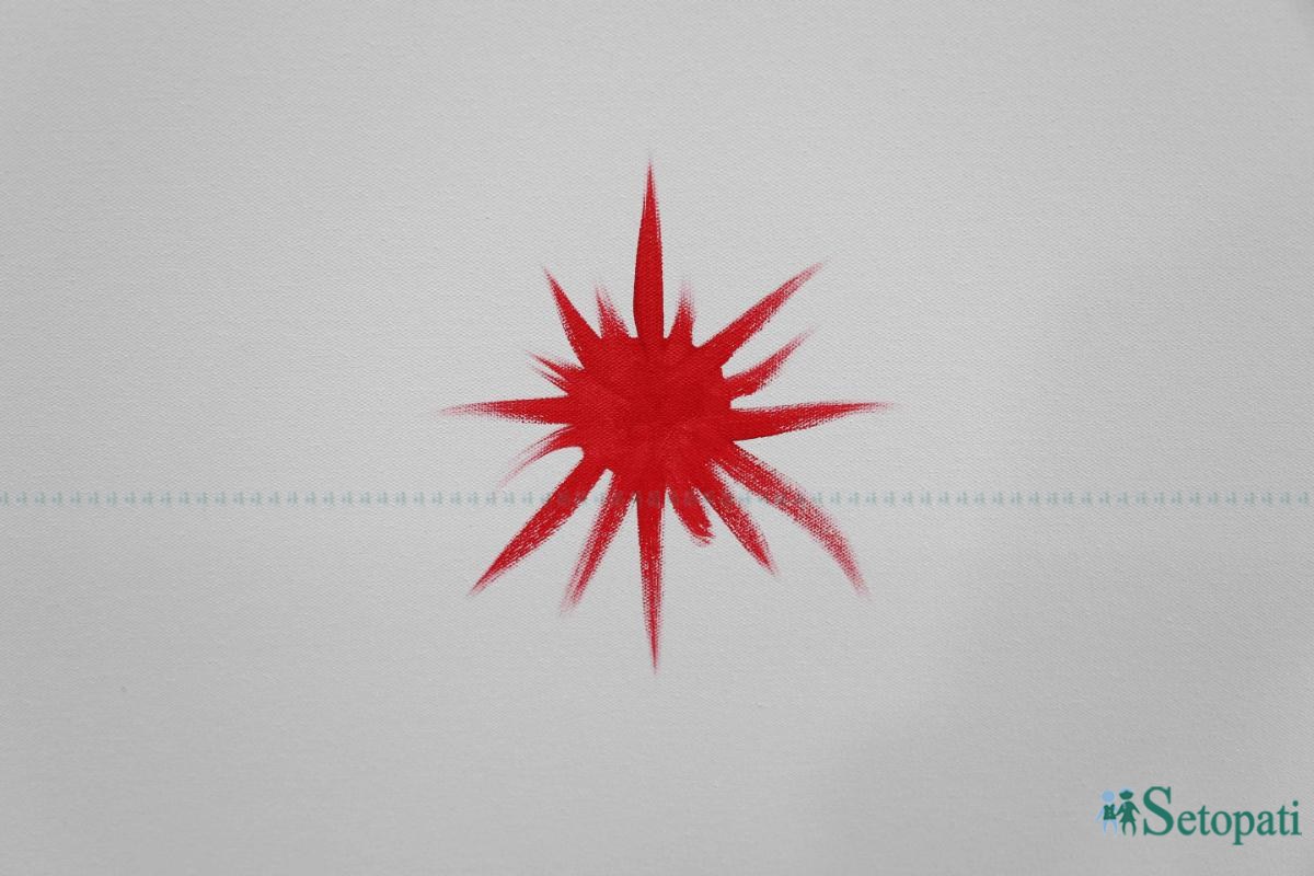 गोदावरीमा भएको एमाले विधान महाधिवेशनमा पार्टीनिकट ललितकला संघले पेन्ट गरेको पार्टी चिह्न। फाइल।